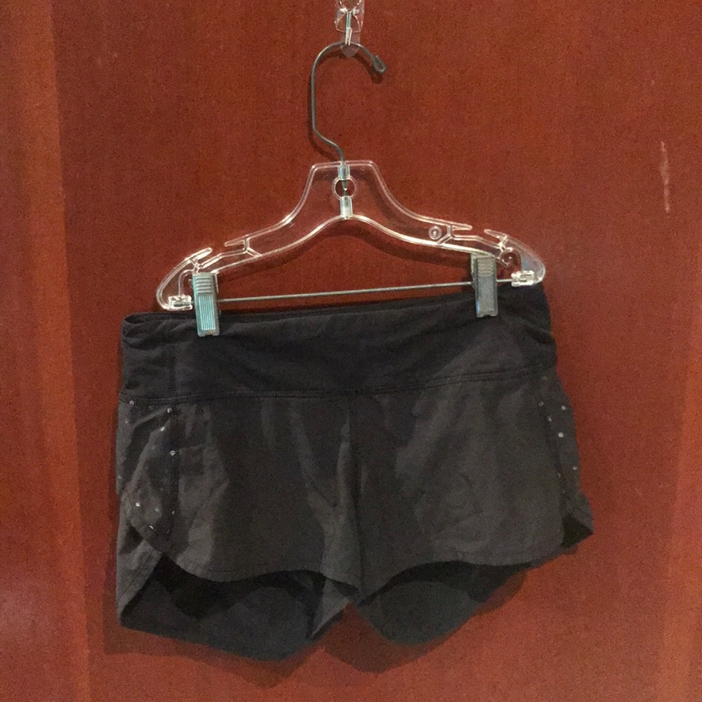 Black lululemon shorts with reflective dots